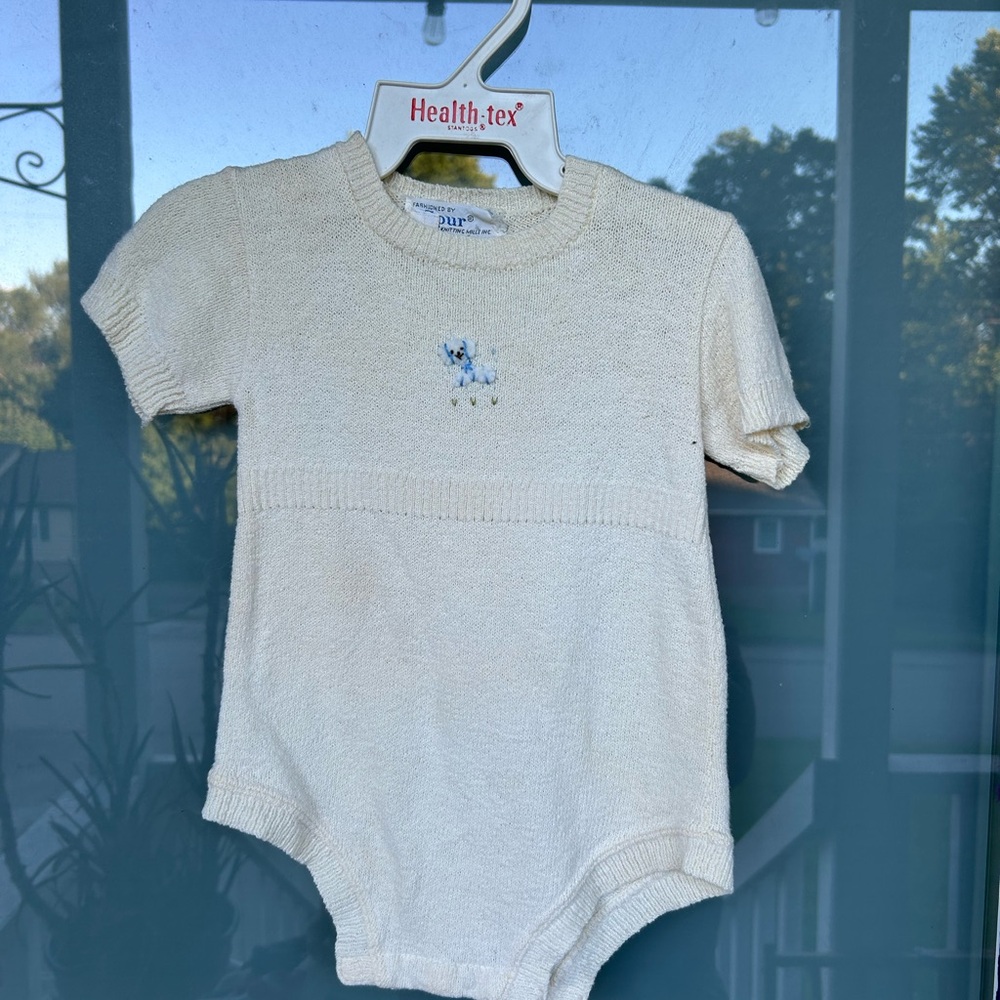 Spur Knit Ivory Baby Onesie with Embroidered Detail